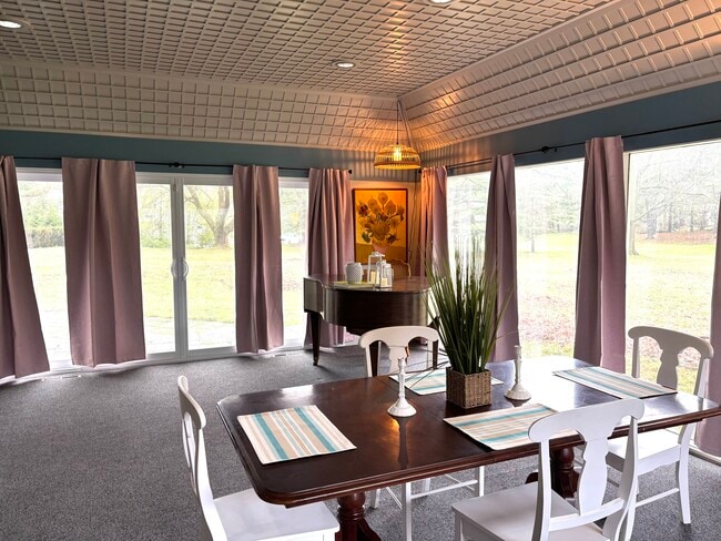 Dining area in Conservatory - 439 Allens Creek Rd