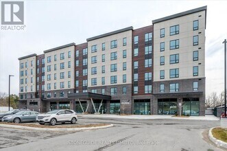 Building Photo - 220-555 BONACCORD St