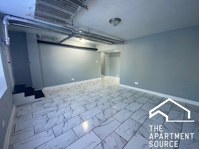 Foto del edificio - 5664 N Ridge Ave