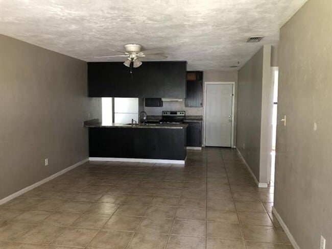 Photo - Fenced yard with NO CARPET in Melody Hills! Apartment