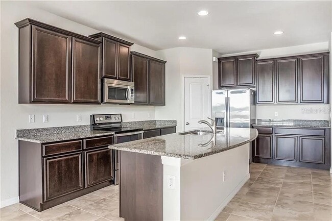 Building Photo - 9215 Mountain Magnolia Dr