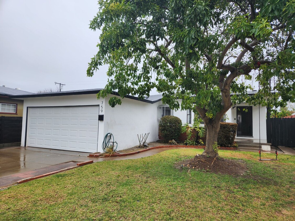 Primary Photo - Charming Orange Home Settled in a Peaceful...
