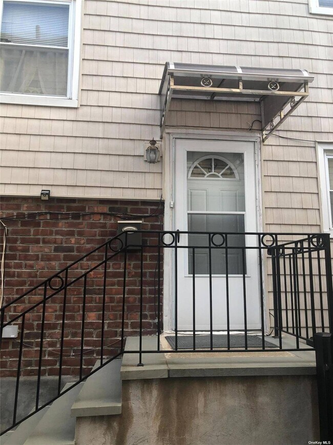 Building Photo - 15-54-54 209th St