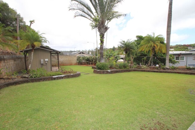 Foto del edificio - 4-bedroom Home with Huge Covered lanai and...