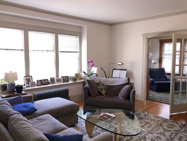 Living Room with Adjacent Sunroom - 204 Lake View Ave