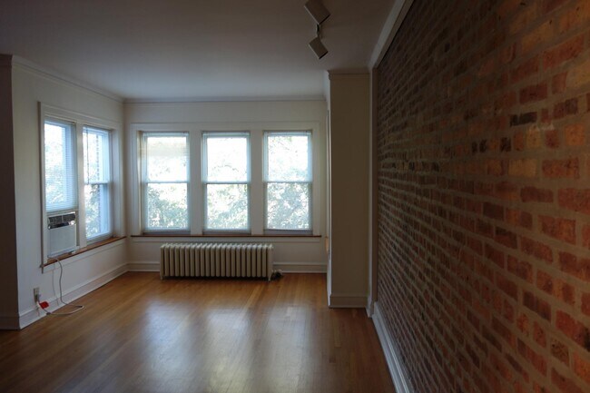 Sun Room - 6629 N Glenwood Ave