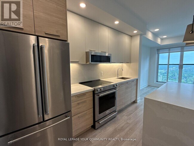 Photo du bâtiment - 200-3200 Redpath Ave
