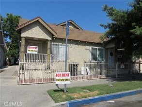 Building Photo - 3923 Normandie Ave