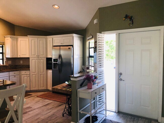 Building Photo - Experience the Gated Waterfront Community,...