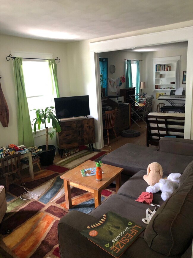 Front of apartment living room, leads into dining room - 317 E Falls St