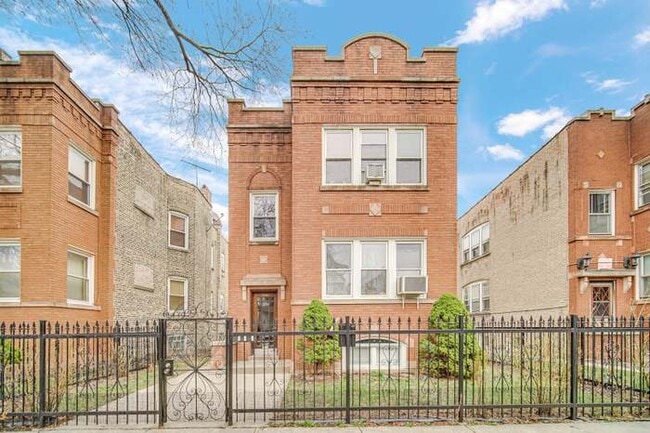 Photo - 2441 N Tripp Ave Apartments