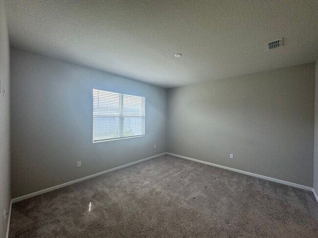 Building Photo - Where Modern Comfort Meets 4BD/3BA Hometown Charm — Your Story Begins in Okahumpka! FULLY-FENCED!...