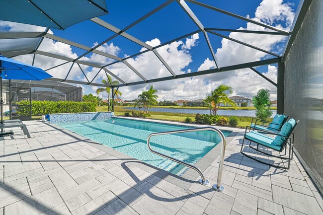 Building Photo - Annual Lease ~ Stunning 4 BED/3BATH Pool H...