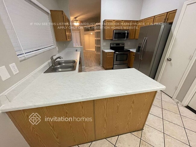 Building Photo - 10728 E Enid Ave