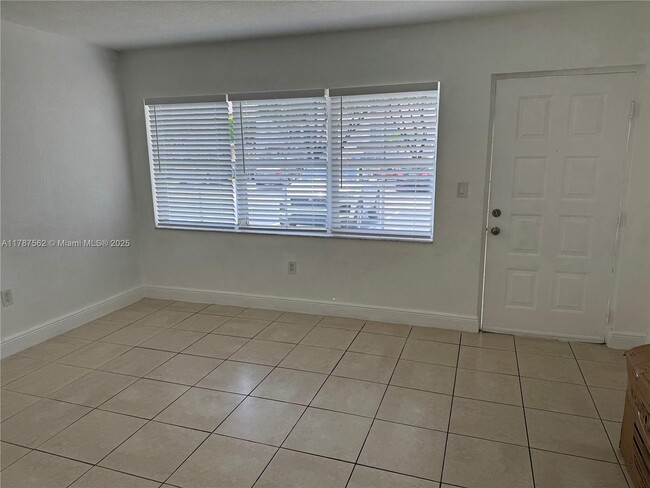 Building Photo - 8695 NW 6th Ln
