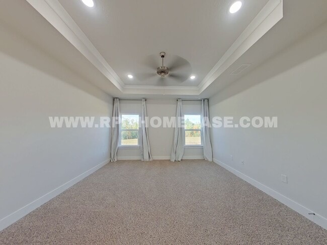 Foto del edificio - Spacious 4-Bedroom Home with Community Pool and Modern Features in Shoal River Landing