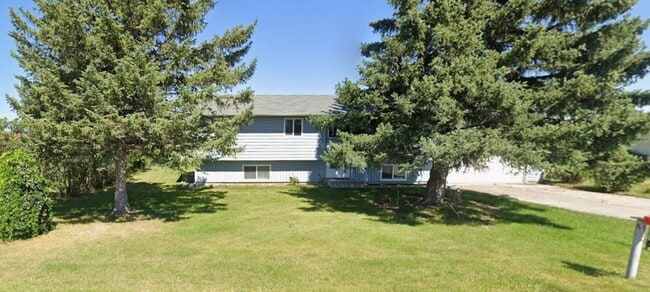 Building Photo - Beautiful House with 2 Wood Stoves across from park in Kalispell