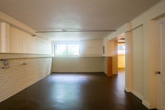 Building Photo - Amazing Find! Spacious Daylight Basement Studio with Loads of Character!