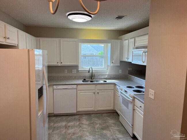 Foto del edificio - 6473 Sandkey Cove