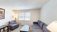 Located at 100 Park Blvd in Cherry Hill, NJ, this single-floor, two-bedroom, one-bathroom residence offers a practical and comfortable layout across a well-utilized floor plan. The living room features plush carpeting, textured ceilings, and multiple windows that allow natural light to fill the space, creating a warm and inviting atmosphere. The kitchen is equipped with warm oak cabinetry, dark granite-style countertops, a gas range, dishwasher, and a full-size refrigerator. Multiple windows brighten the kitchen and adjacent dining area, making it a pleasant space for everyday meals. The primary bedroom is a comfortable retreat with carpeted floors, a window overlooking the outdoors, and ample room for furnishings. The second bedroom is similarly appointed with a window that brings in natural light and views of the surrounding area. Both rooms feature textured ceilings consistent with the rest of the home. The bathroom includes a white vanity with under-cabinet storage, a mirrored medicine cabinet, and tile wainscoting, offering a clean and functional design. Two hallways connect the rooms efficiently throughout the single-story layout. Overall, this residence presents a tidy, well-maintained living environment in Cherry Hill, NJ.