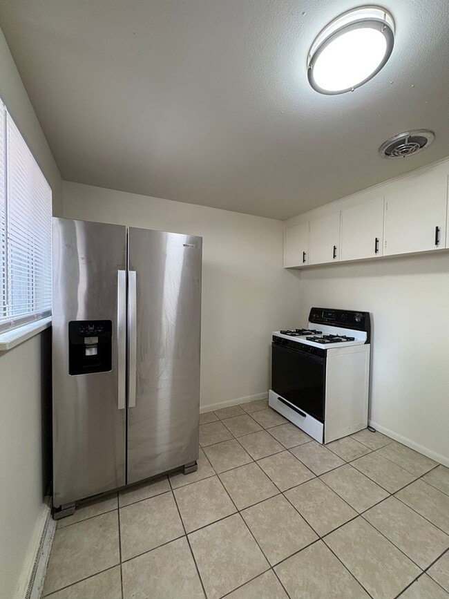 Photo - 7557 W 8th Pl Apartment
