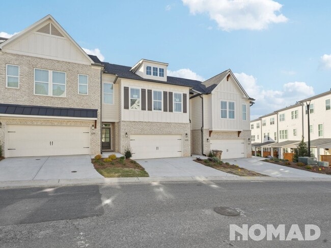 Building Photo - New construction 4 Bedroom Townhome in Cum...