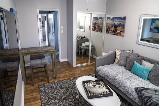 TV, dinette, daybed, dresser, chair, closet - 617 Douglas Ave