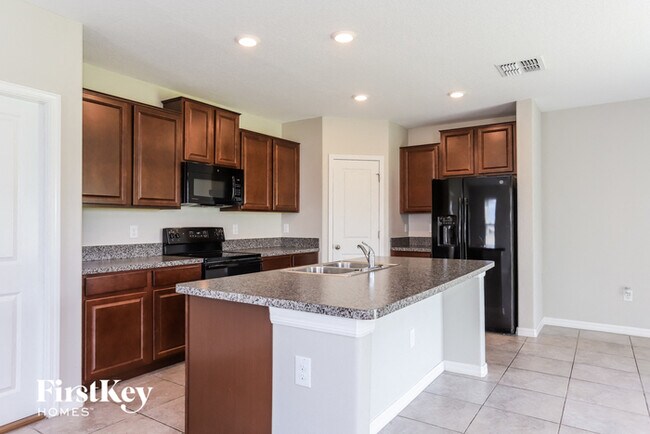 Foto del edificio - 5103 Brickwood Rise Dr