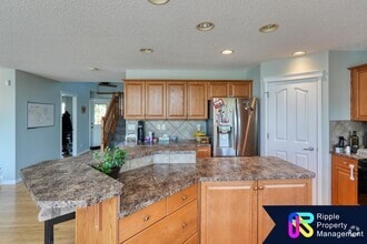 Building Photo - 75 Cougarstone Way SW