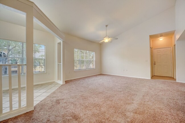 Building Photo - Two bedroom on 2nd floor condo in gated ne...