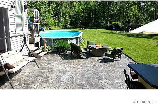 Stamped concrete patio, with gas firepit - 344 Haley Rd