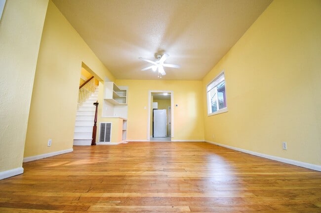 Building Photo - Spacious 4BD/2BA Two-Story Home w/ Fenced Yard & Huge Basement! Pets OK!