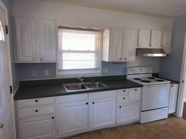 Foto del edificio - Village, home