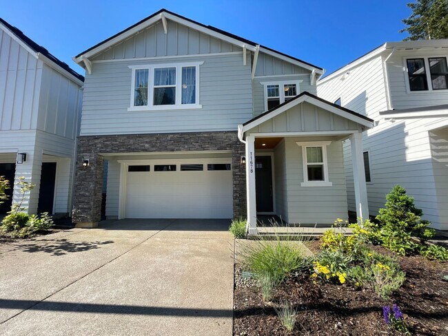 Building Photo - Beautiful Cedar Mill Landing home offers 4...