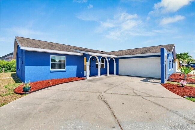 Building Photo - 6525 Manila Palm Way
