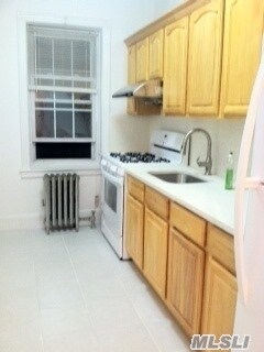 Building Photo - 63-43 Haring St