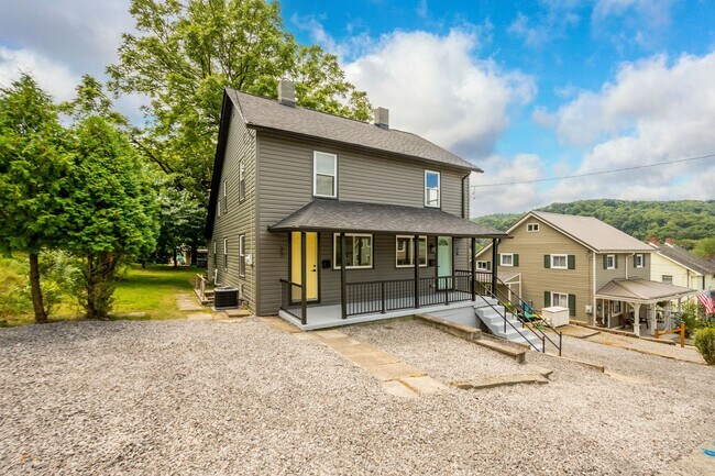 Building Photo - READY FOR MOVE IN! NEW RENOVATIONS in this...