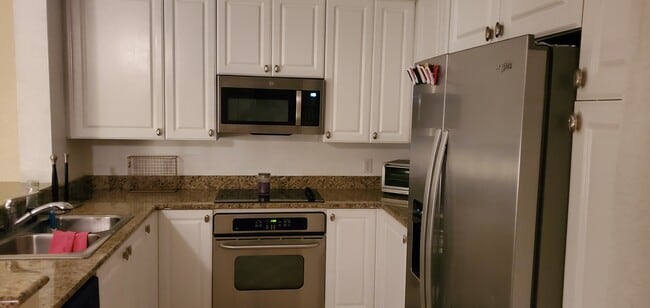 From entrance to kitchen - 1660 Renaissance Commons Blvd
