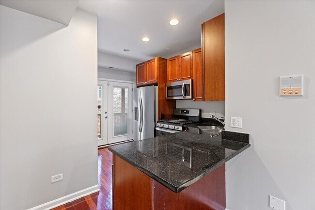 Foto del edificio - 1360 W Greenleaf Ave