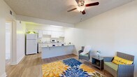 Located at 125 S Dobson Rd in Chandler, AZ, this efficient one-bedroom, one-bathroom unit is thoughtfully laid out across a single floor. The open-concept kitchen and living area serves as the heart of the home, where a peninsula counter separates the two spaces while maintaining a bright, connected feel. The kitchen is outfitted with white cabinetry, ample counter space, a full-size refrigerator, dishwasher, and built-in appliances. Light hardwood-style flooring runs throughout the unit, complementing the neutral wall tones and textured ceilings. Ceiling fans are installed in the main living area and bedroom, promoting airflow and comfort. The living area benefits from a large window that invites natural light and provides outdoor views. The bedroom is a comfortable, well-proportioned room with its own window fitted with vertical blinds and a dedicated ceiling fan. A walk-in closet with built-in shelving provides organized storage space. The full bathroom features a tub/shower combination with a clean, white surround. Additional conveniences include a dedicated laundry area and a hallway that connects all rooms efficiently. The overall ambiance is clean, functional, and well-maintained, making it a practical home in the heart of Chandler.