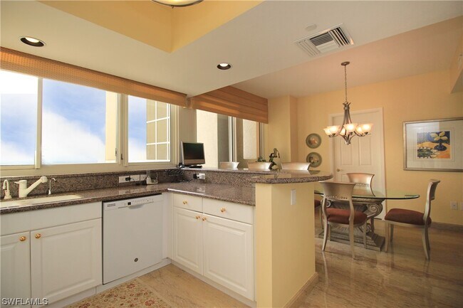 Building Photo - 7117 Pelican Bay Blvd