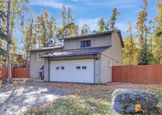 Building Photo - Eagle River Home w/ Fenced Yard, Sunroom, and Garage!