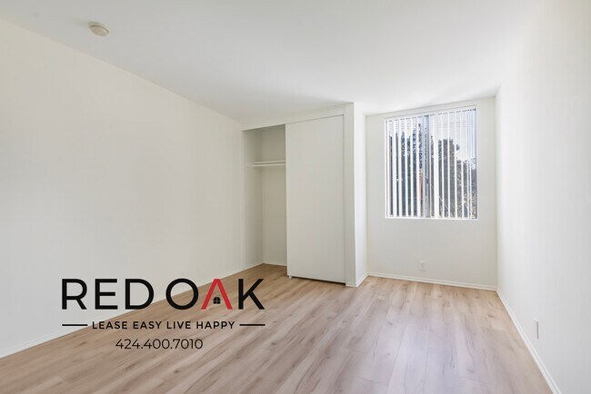 Building Photo - Beautiful Two Bedroom Drenched in Natural ...