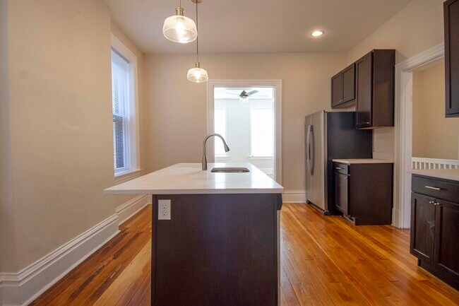 Kitchen looking into living room. - 3439 Utah St