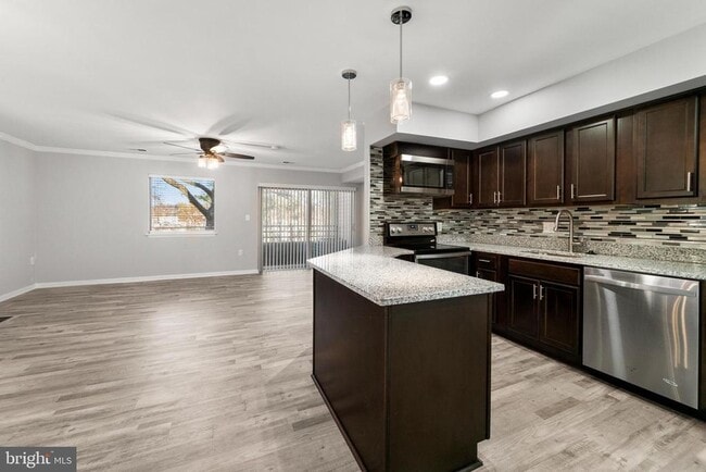 Building Photo - 8103 Greenspring Way