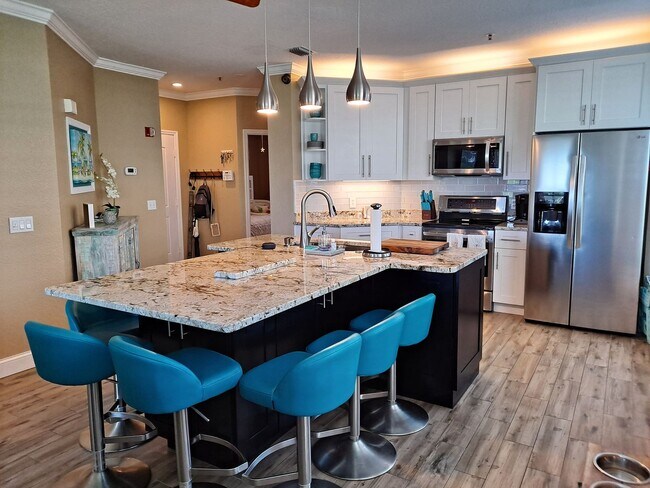 Foto del edificio - 3BR 2BA BOUCHELLE ISLAND GROUND FLOOR COND...