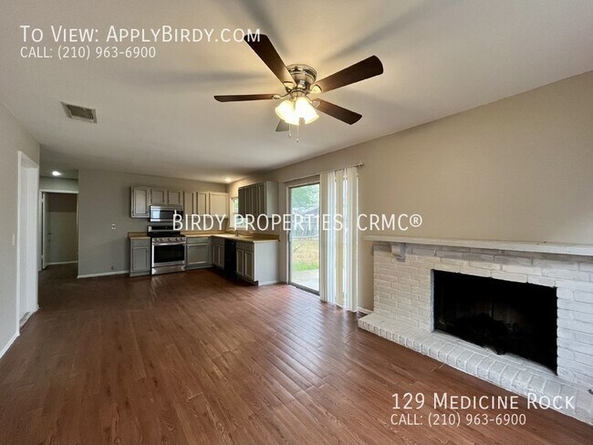 Building Photo - Charming 3-Bedroom Home with Fireplace in ...