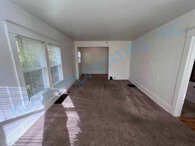 Building Photo - 2 Bd / 1 Bth - Den - Bsmt - Fncd Yd - Pet ...