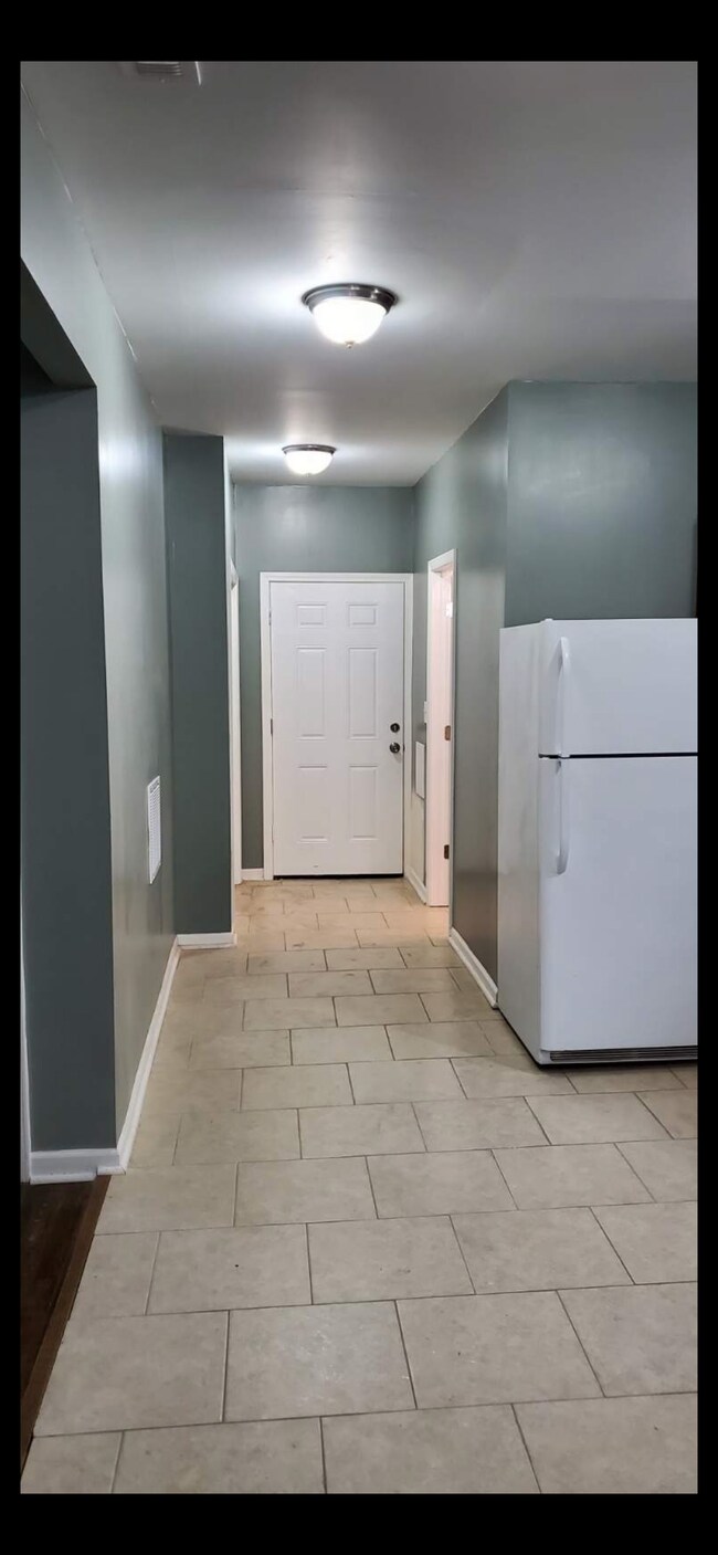 Open concept kitchen area - 9965 S Winston Ave