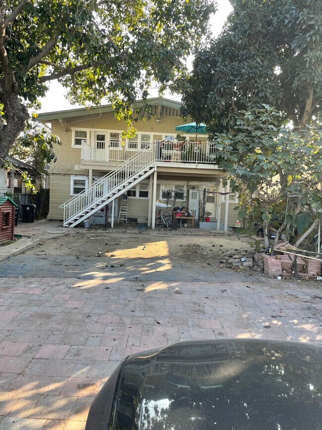 Back street parking - 1467 W Vernon Ave